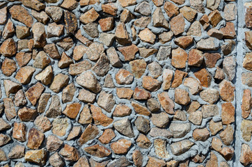 old wall of granite stone