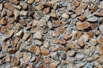 old wall of granite stone
