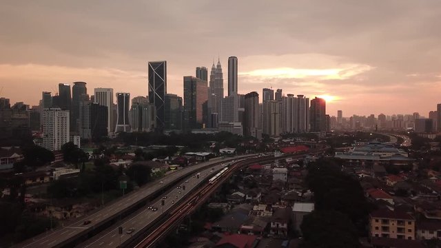 Kuala Lumpur, Malaysia - 1 July 2019: Aerial view of Kuala Lumpur city in Malaysia capital, tall buildings. Cinematic video of skyscrapers in big City.
