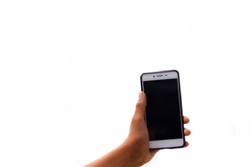 Hand holding white phone isolated on white background