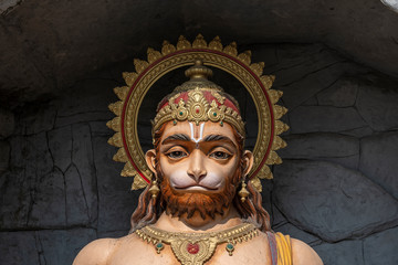 Hanuman statue, Hindu idol near Ganges River, Rishikesh, India. Sacred places for pilgrims