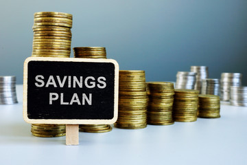 Savings plan and rise chart from coins.