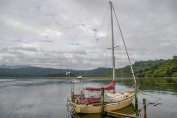 Fototapeta premium Old fashioned sailing yacht moored on the lake
