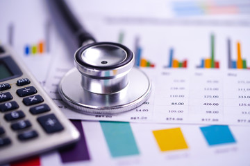 Stethoscope, Charts and Graphs spreadsheet paper, Finance, Account, Statistics, Investment, Analytic research data economy spreadsheet and Business company concept.