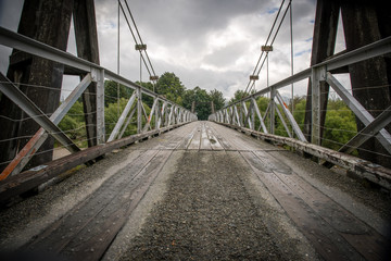 Old Road bridge crossing a new Zealand river