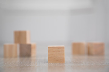 Wooden Block in Focus with Defocused Blocks in Background