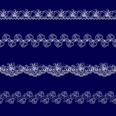 set of white lace ribbons