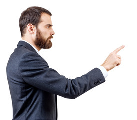 Businessman pointing to something or touching by forefinger.