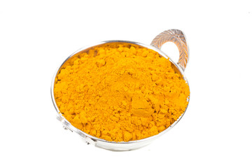 Turmeric powder isolated on a white background