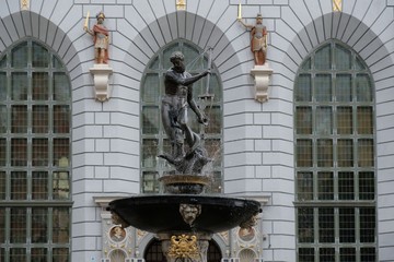 Poland, Gdansk, Old City - famous statue of Neptune fountain and Artus Court in background