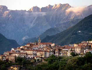 Fototapeta na wymiar Antona village in the Apuan Alps, Alpi Apuane, near the Vestito Mountain Pass. Massa Carrara, Italy, Europe. Sun setting.