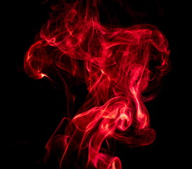 Red smoke on black background