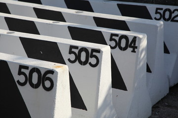 Road blocks with painted numbers in sequence