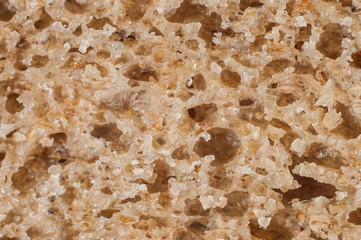 Black classic bread in a cut close-up, macro