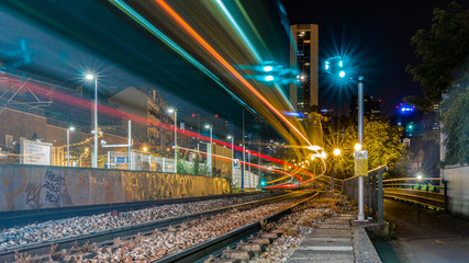 Fototapeta na wymiar Trail of Tramway lights at night