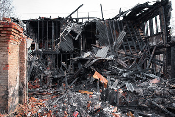 The old wooden burned-down house a view from inside