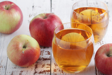 Two glasses with apple juice