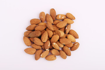 Pile of almond at white background