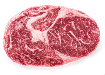 Raw Ribeye steak or beef steak isolated on white background.