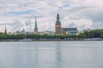 City Riga, Latvia Republic. View to old city and river Daugava. Urban city in summer. July 4. 2019 Travel photo.