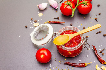 Tomato confiture, jam, chutney, sauce. Homemade preservation concept