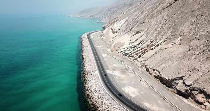 Coastal road and seaside in Musandam Governorate of Oman aerial footage