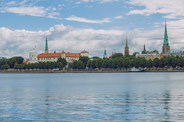 Obraz premium City Riga, Latvia Republic. View to old city and river Daugava. Urban city in summer. July 4. 2019 Travel photo.