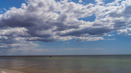 Obraz premium white clouds float across the blue sky