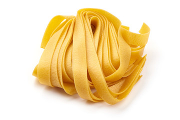 Italian Fettuccine pasta, close-up, isolated on white background - obrazy, fototapety, plakaty