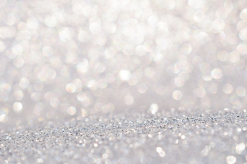 shine and sparkle of silver glitter abstract background	