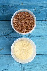 SUPERIOR VIEW OF ITALIAN PASTA ON BLUE BACKGROUND WITH TEXTURE