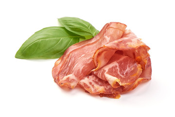 Italian prosciutto crudo or jamon, smoked ham, close-up, isolated on white background