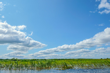 Low clouds over water in windy weather on the Pripyat River in Ukraine.