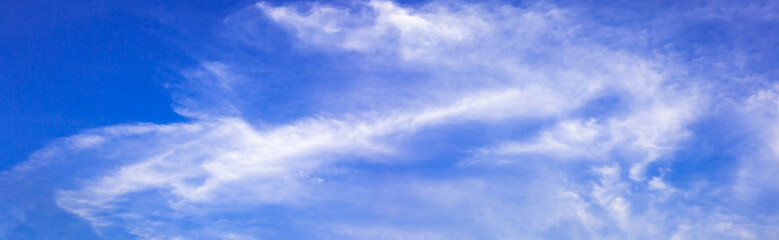 Naklejka na ściany i meble Panorama blue sky with tiny clouds