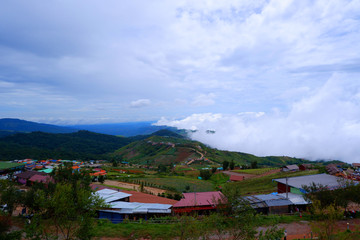 Fototapeta premium Phutubberk at Lomkao Phetchabun,Thailand - July 7 2019 : Mountain mist and resort camping in Phutubberk most famous travel place in Phetchabun Thailand
