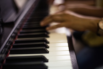 Fototapeta premium Reaching for the right notes.