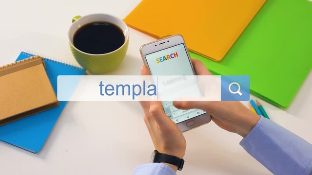 Templates word written in smartphone search bar by female designer, request
