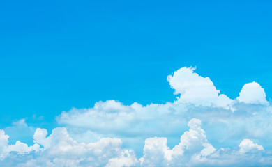 Naklejka na ściany i meble Beautiful blue sky and white cumulus clouds abstract background. Cloudscape background. Blue sky and fluffy white clouds on sunny day. Nature weather. Bright day sky for happy day background.