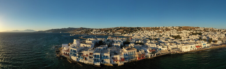 Obraz premium Aerial drone photo of iconic colourful white washed and picturesque little Venice in main town of island of Mykonos, Cyclades, Greece