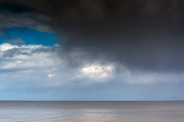 Dark sky over gulf of Riga, Baltic sea.