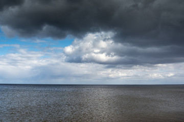 Dark sky over gulf of Riga, Baltic sea.