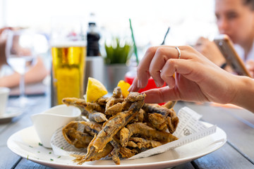 Fried anchovies at a seaside terrace