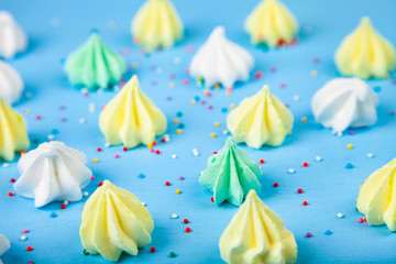 Meringue on a blue  wooden background