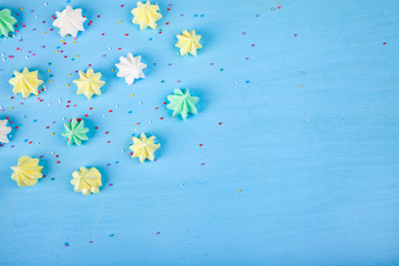 Meringue on a blue  wooden background