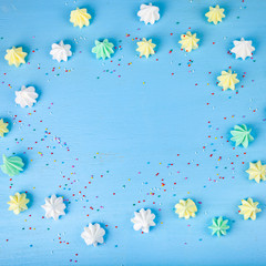Meringue on a blue  wooden background