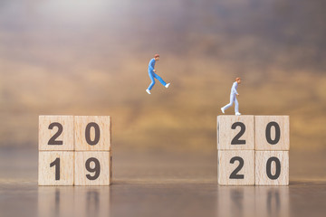Miniature people Jump from number 2019 to 2020