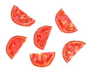 Ripe red tomato slices isolated on white background, top view