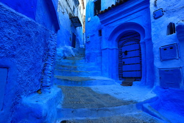 Blue street walls of the popular city of Morocco, Chefchaouen. Traditional moroccan architectural details. - 277333210