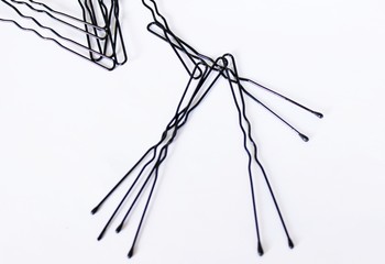 Women's hairpins on a white background