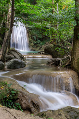 Clean green emerald water from the waterfall Surrounded by small trees - large trees,  green colour, Erawan waterfall, Kanchanaburi province, Thailand